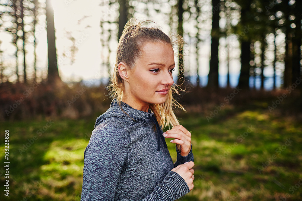 beautiful young girl smiling and walking in forest in running cl beautiful young girl smiling and walking in forest in running cl
