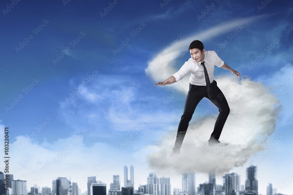 Asian business person flying with the cloud Asian business person flying with the cloud