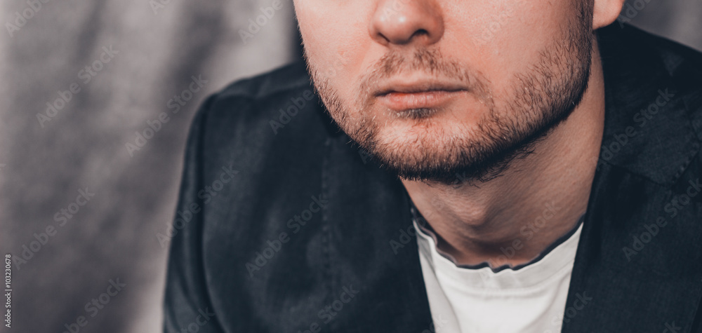 Fototapeta premium Close portrait of man with gray backgroud