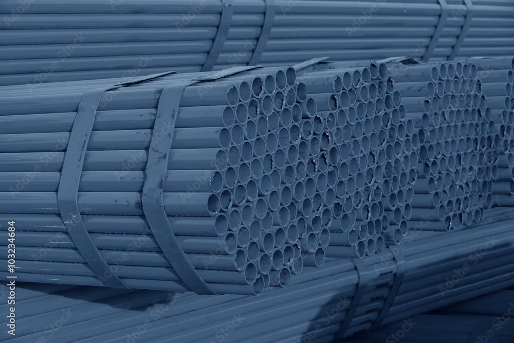 Many steel pipes stacked together Many steel pipes stacked together