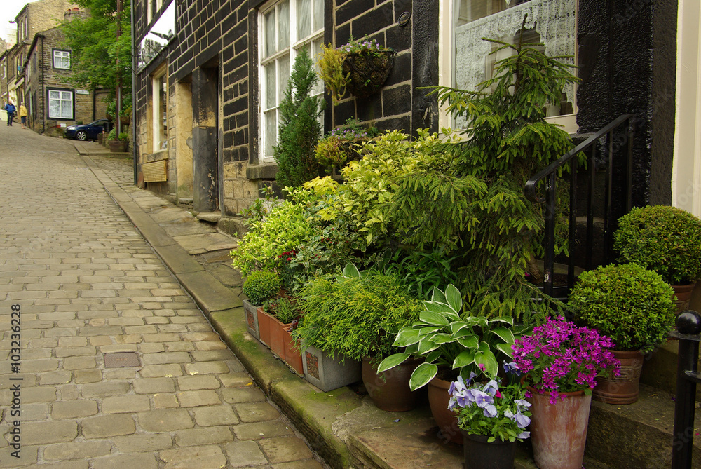 HAWORTH, ENGLAND - June, 2013: Traditional English garden in fro