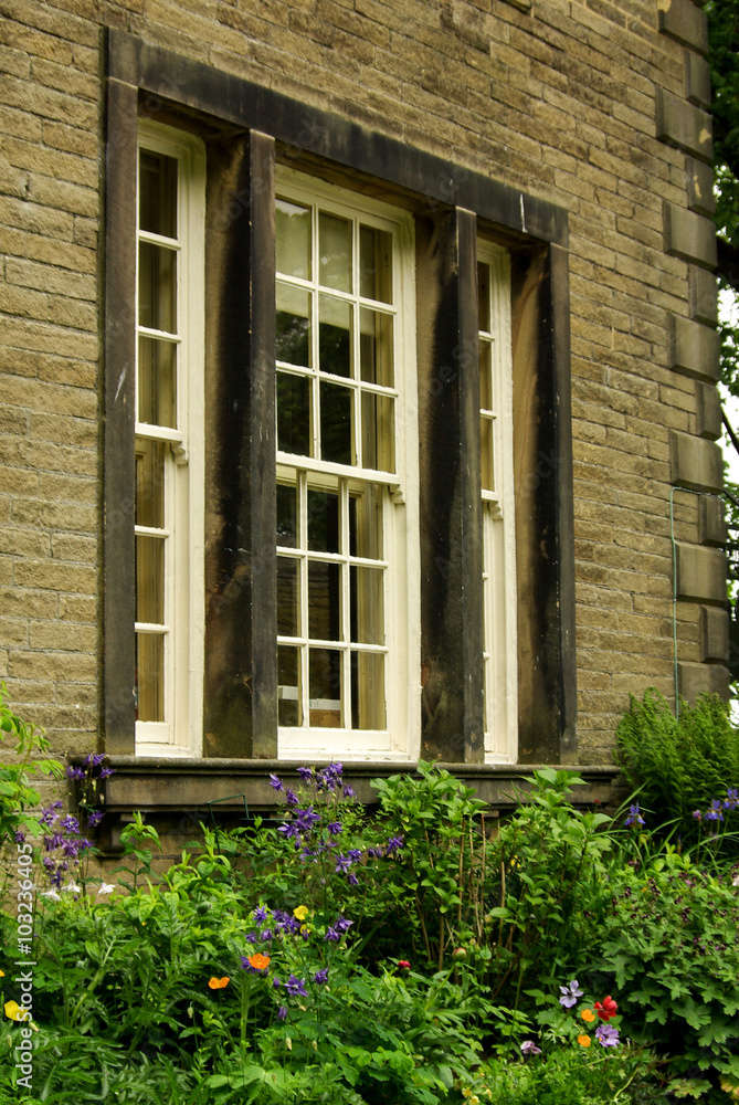 HAWORTH, ENGLAND - June, 2013: Decorated with fresh flowers wind HAWORTH, ENGLAND - June, 2013: Decorated with fresh flowers wind