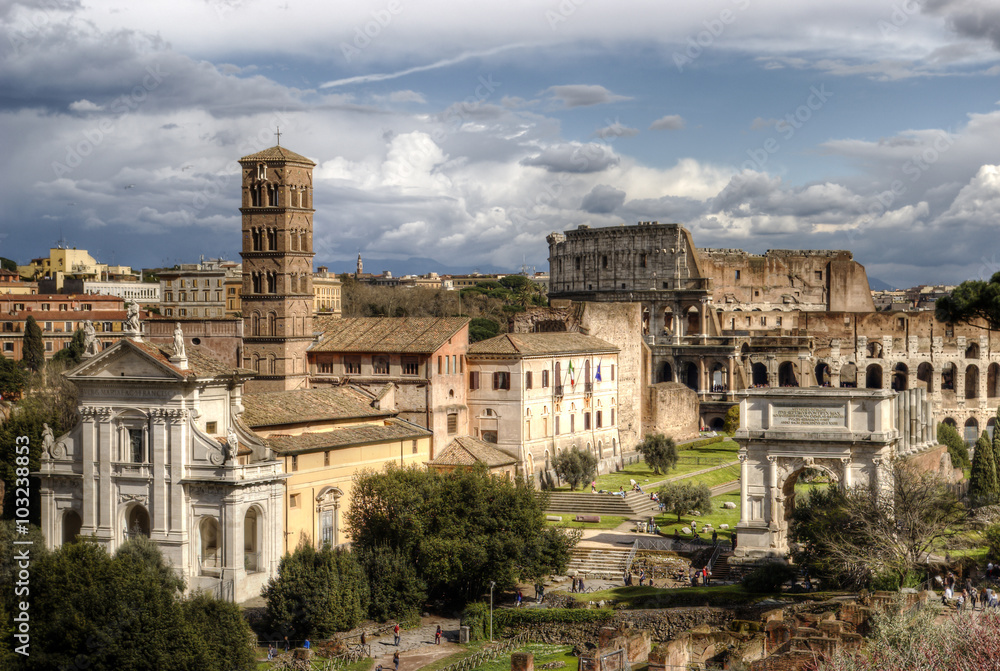Roman Forum. The Temple of Venus and Roma, Church of Santa Francesca Romana, The Arch of Titus, The Colosseum. Rome, Italy.