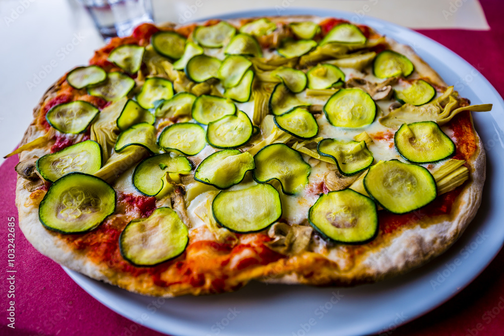 Pizza with vegetables and zucchini, Italian cuisine Pizza with vegetables and zucchini, Italian cuisine