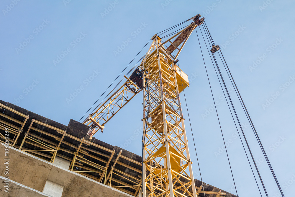 Fototapeta premium Building under construction and crane.
