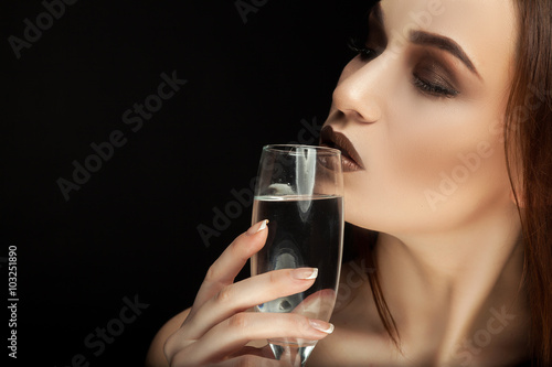 portrait of a girl with a glass of wine