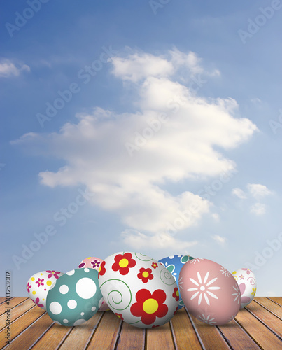 easter eggs on wood floor with sky background