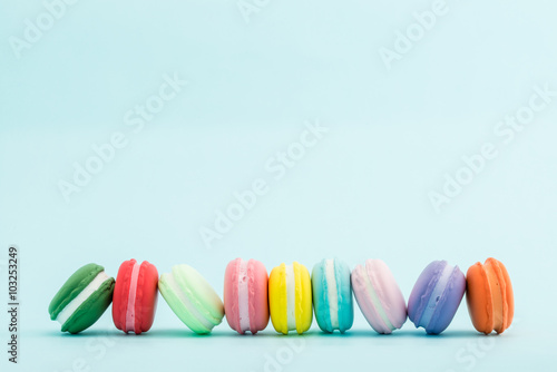 French colorful macarons on pastel background, retro Styled