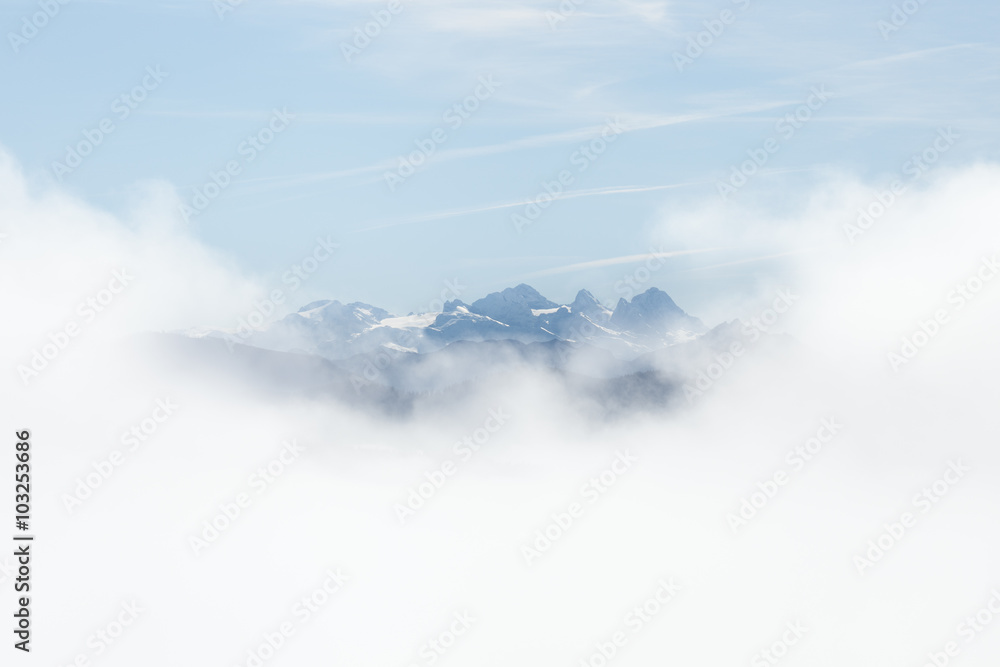 Fototapeta premium The mountain Dachstein covered in clouds