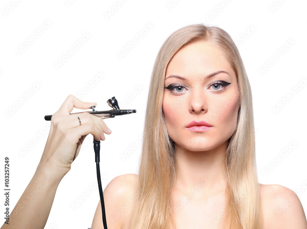 Fashionable portrait of a girl model with hand airbrush. Fashion, glamour accessories, evening makeup. Freedom spring bright style, nude shoulders.. Fashionable portrait of a girl model with hand airbrush. Fashion, glamour accessories, evening makeup. Freedom spring bright style, nude shoulders..