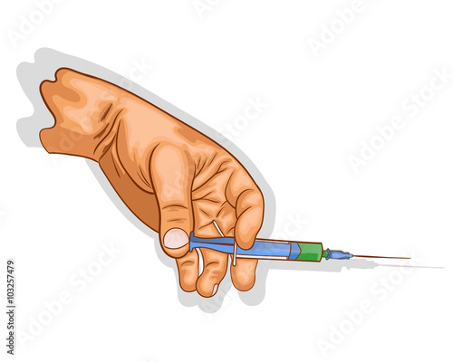 hand holds the syringe with the vaccine.