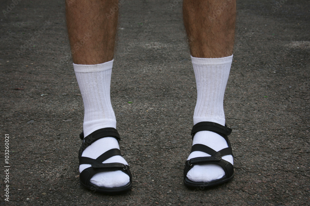 Men's feet in sandals