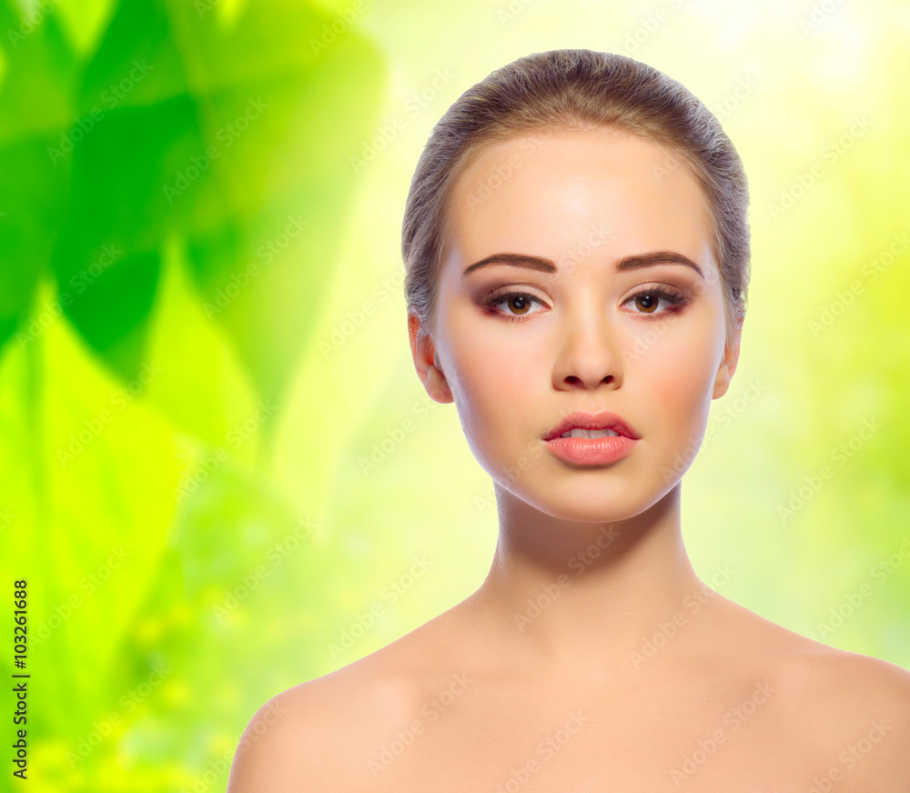 Young healthy girl on floral background Young healthy girl on floral background