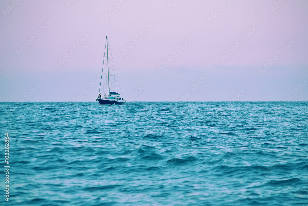Boat near the coast in the red sea with crystal water