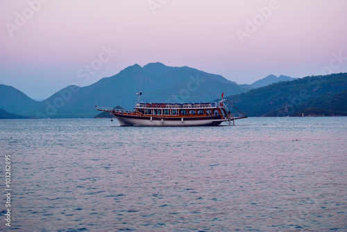 Boat near the coast in the red sea with crystal water