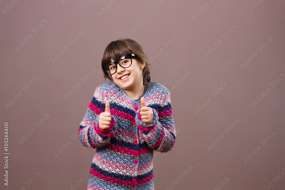 Little nerdy girl giving thumb up Little nerdy girl giving thumb up