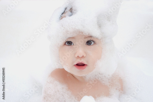  Happy little baby a swimming in the bathroom