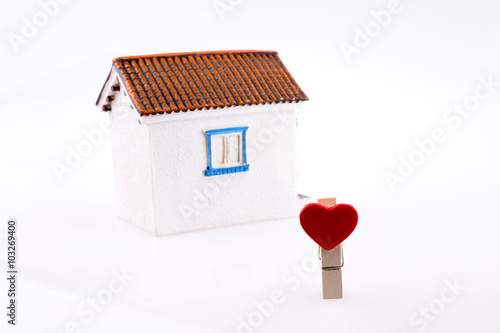 House and clipped heart photo