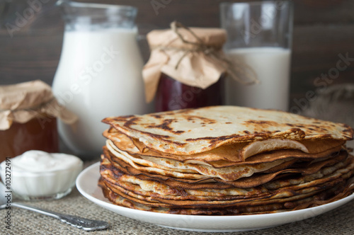 Fotografie crepes and milk, jam, sour  cream
