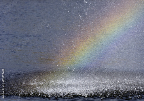 Rainbow in the spray photo