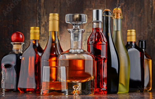 Fotografia Bottles of assorted alcoholic beverages
