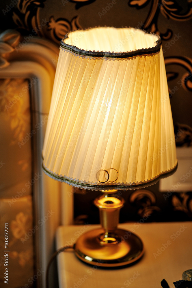 lamp on the bedside table in bedroom