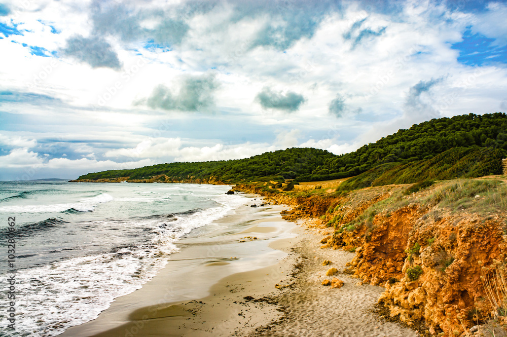 Platja de Binigaus, a nudist beach in the south of Menorca, Spain Platja de Binigaus, a nudist beach in the south of Menorca, Spain