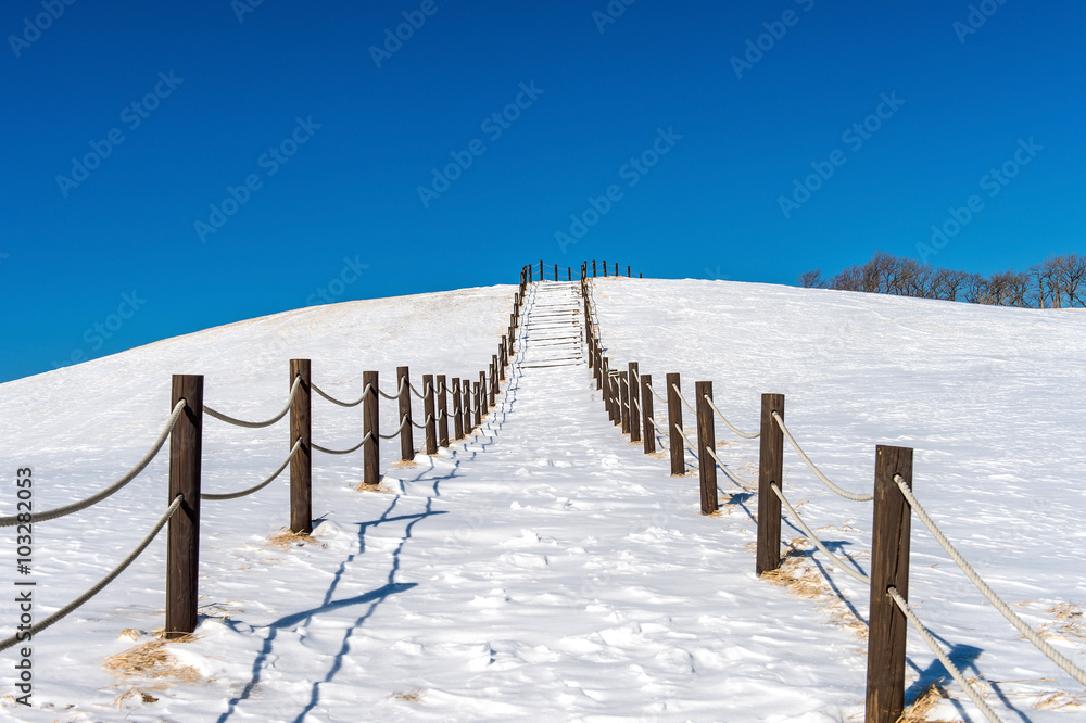 Beautiful snow stair walkway and blue sky with snow covered,Wint Beautiful snow stair walkway and blue sky with snow covered,Wint