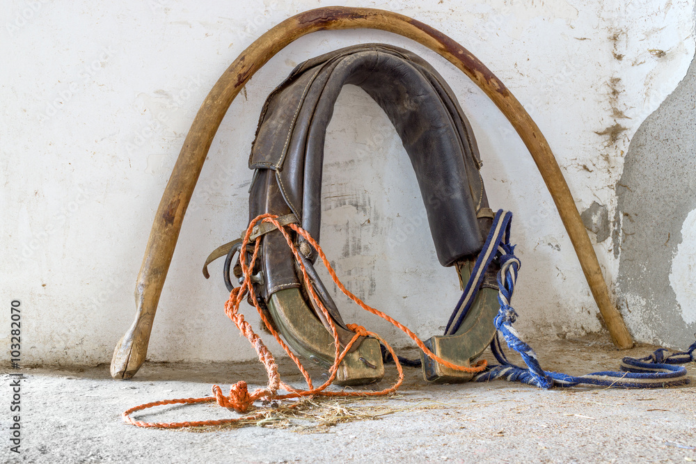 Old horse collar near wall Old horse collar near wall