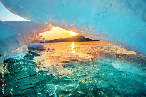 Very large and beautiful chunk of Ice at Sunrise in winter.