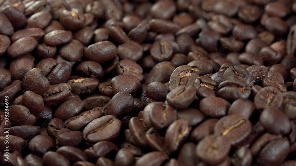 Portion of roastet Coffee Beans as seamless loopable 4K UHD footage Portion of roastet Coffee Beans as seamless loopable 4K UHD footage
