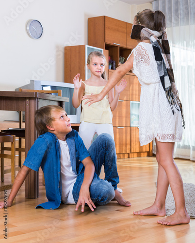 children playing at Blind man bluff indoors photo