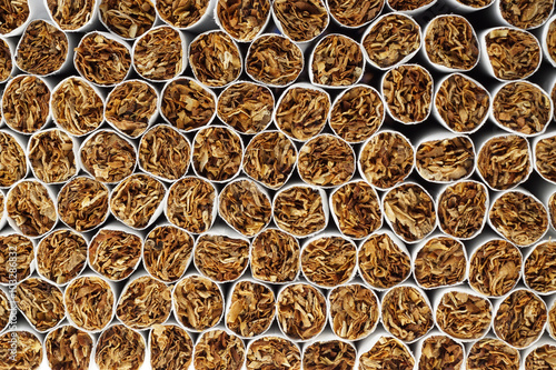 Heap of Tobacco Cigarettes, stack as a background texture, close