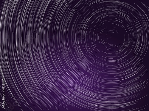 Astronomy concept. Startrails around Polaris star and purple aurora on night sky.