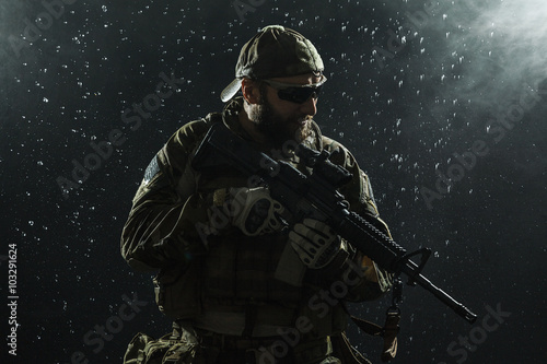 US Army soldier in the rain © Getmilitaryphotos