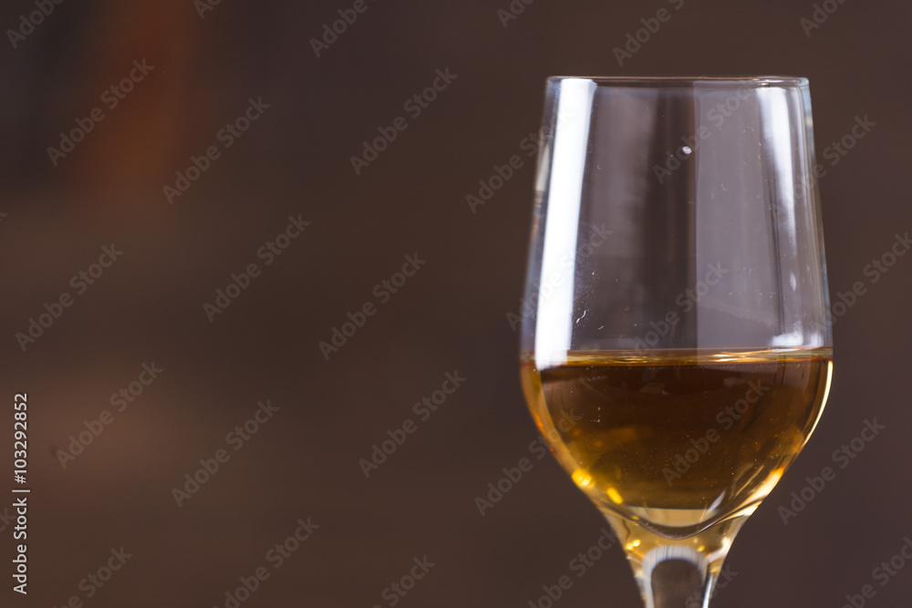 whiskey in glass on wood background whiskey in glass on wood background
