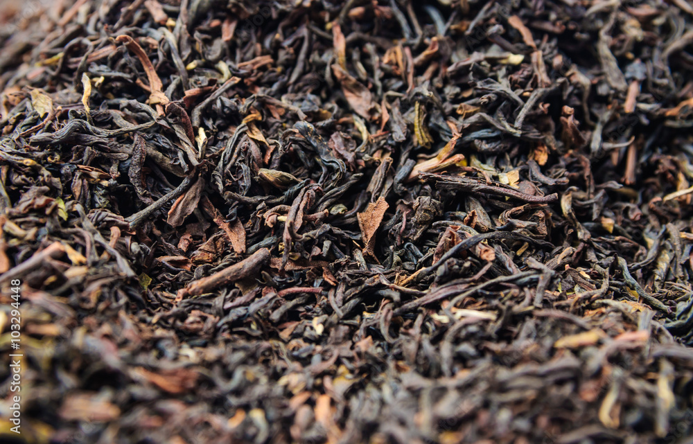 Background of dry black tea with flavors Background of dry black tea with flavors