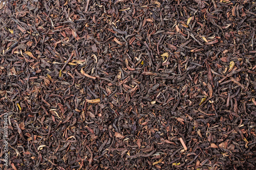 Background of dry black tea with flavors