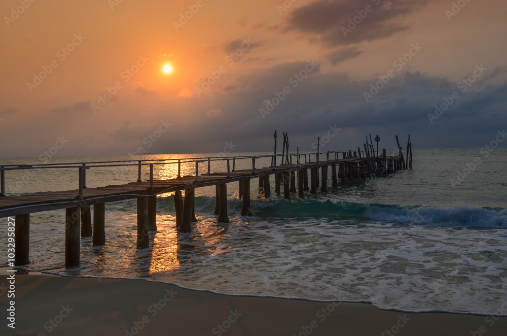 Old wood pier, sunset, Ko Samet island, Thailand