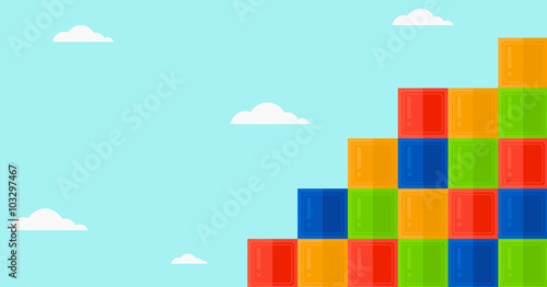 Background of colorful cubes on blue sky