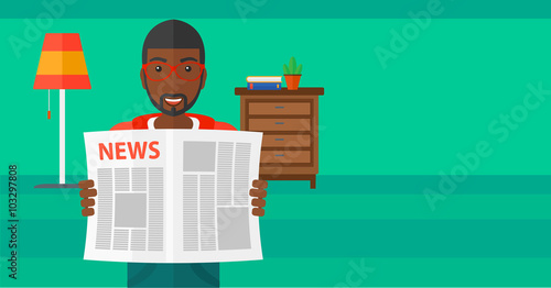 Reporter reading newspaper.
