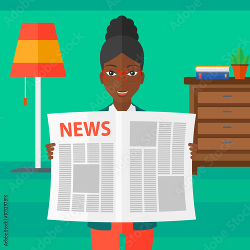 Reporter reading newspaper.