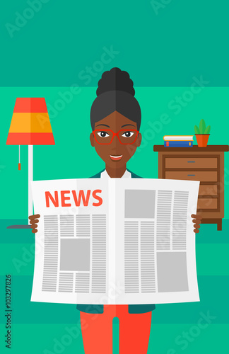 Reporter reading newspaper.