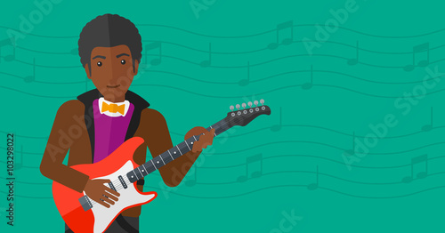 Musician playing electric guitar.