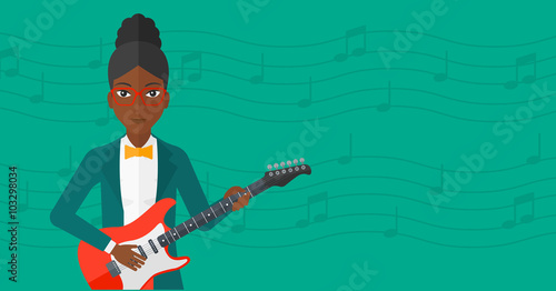 Musician playing electric guitar.