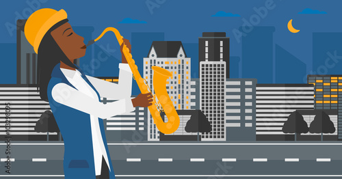 Woman playing saxophone.