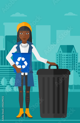 Woman with recycle bins. photo