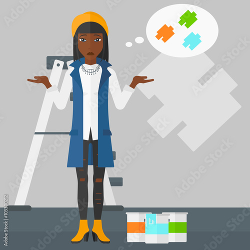 Woman choosing paint color.