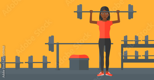 Woman lifting barbell.