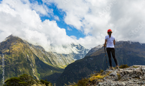 Fotografija Woman hiker enjoys the view of Key Summit with Ailsa Mountain at